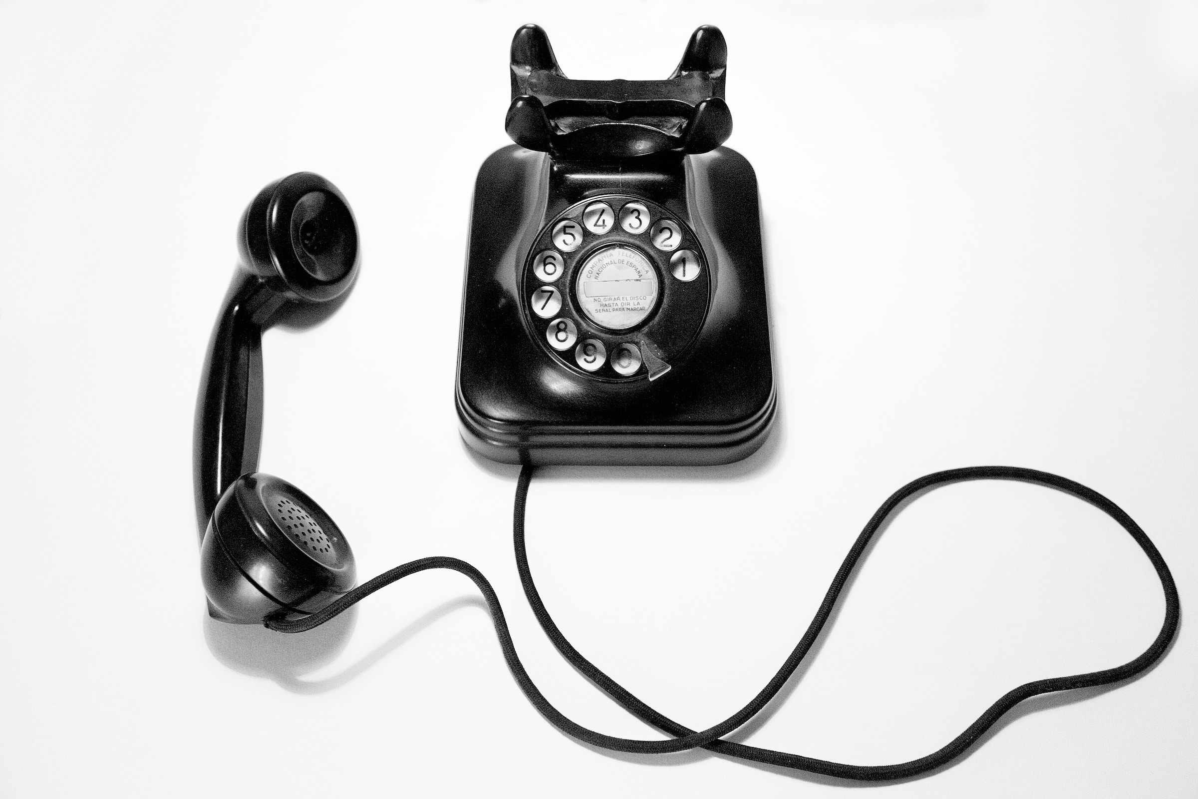 A vintage black roytory telephone that can be use to phone crisis and suicide prevention resources.