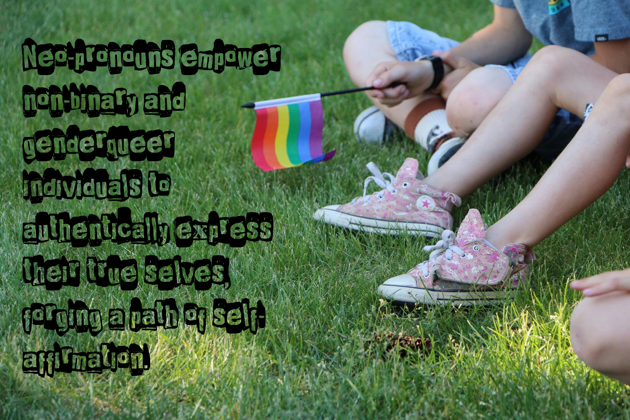 A picture of children's feet on the green grass, and one holds a small pride flag. Over the grass are the words, Neo-pronouns empower non-binary and genderqueer individuals to authentically express their true selves, forging a path of self-affirmation.